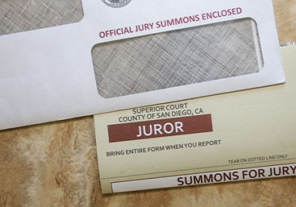 Jury duty summons and envelope.