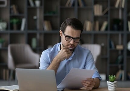 An employer getting ready to submit an employee's background check.