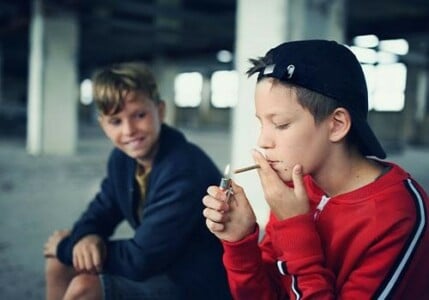 Young boys smoking