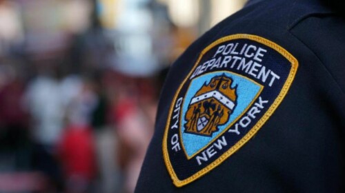 An NYPD patch on a sleeve.